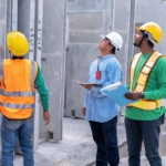 At building construction site supervisor check quality precast concrete panel before installation